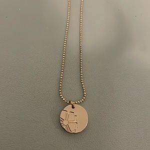 Trina Turk Necklace with Circle Pendant with Flower Details